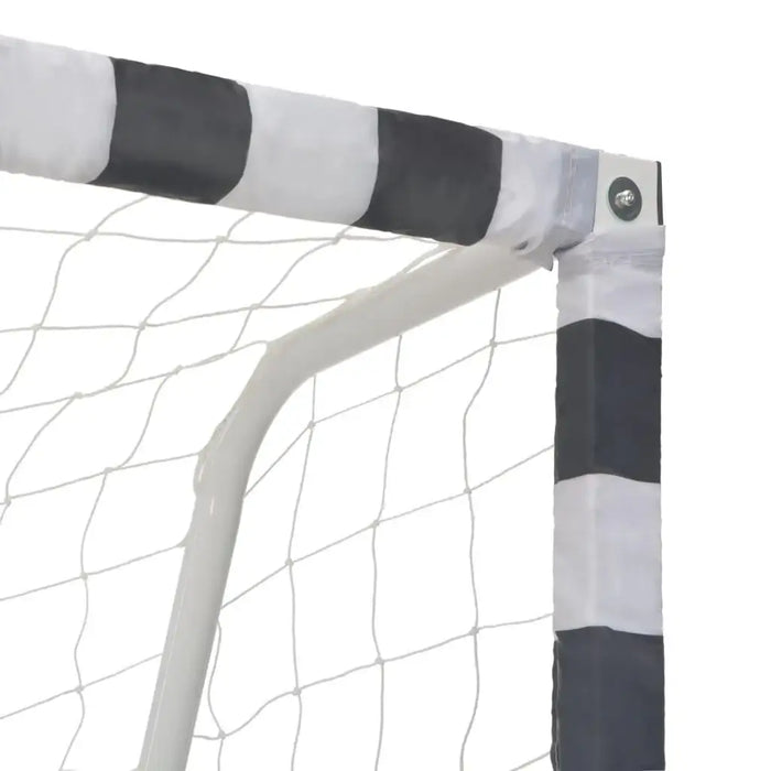 Black and white metal football goal post with heavy duty netting, close-up view.