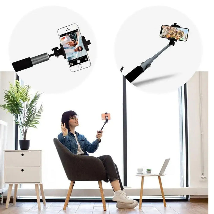 Bluetooth selfie stick monopod with phone holder in modern room setting