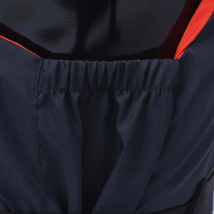 Close-up of navy blue buoyancy aid with orange trim and elastic back panel