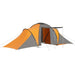 Grey and orange 6-person camping tent with extended vestibule, pitched outdoors