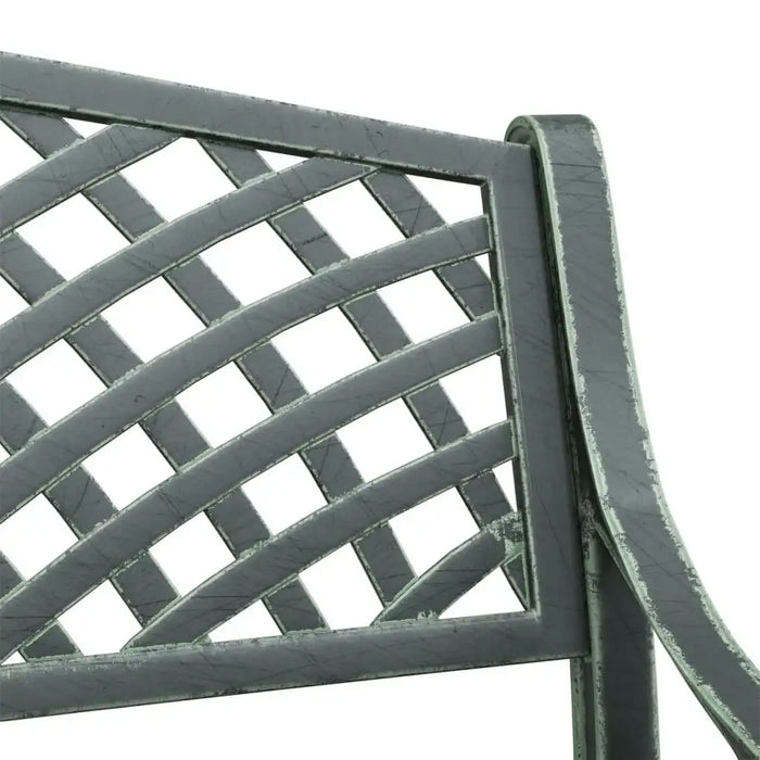 Green cast aluminium garden bench with lattice backrest and decorative frame