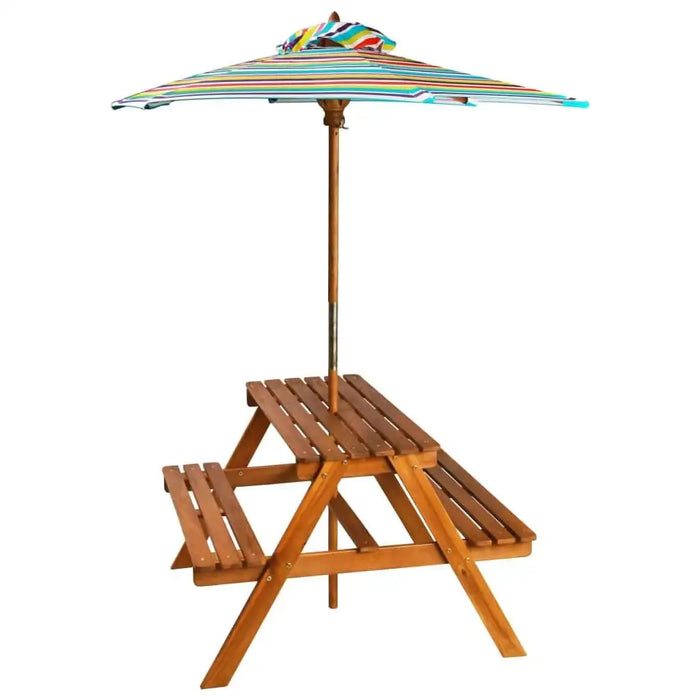 Children's wooden picnic table with benches and a colorful striped parasol