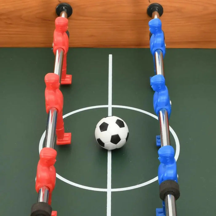 Compact professional football table with red and blue players and a soccer ball on green field