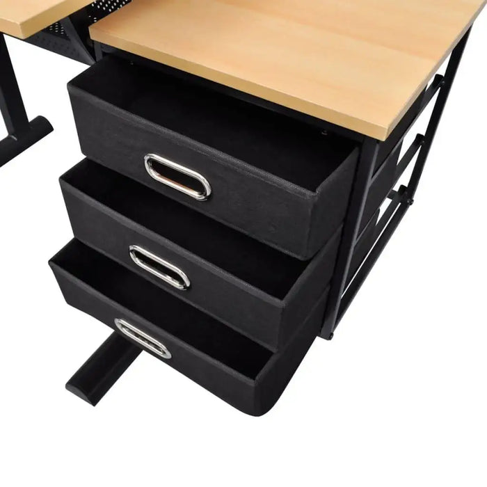 Drawing table with light wood worktop and three open black drawers
