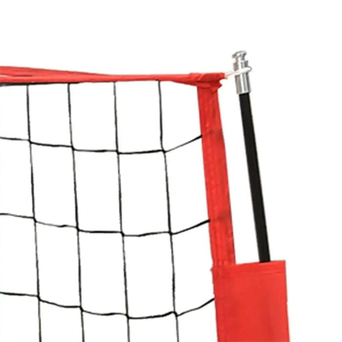 Foldable portable football goal with red frame and black net, close-up view