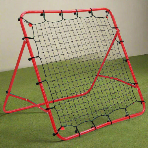 Football rebounder with red steel frame and black net on green indoor turf