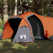 Three-person grey and orange taffeta camping tent set up in a sunny forest clearing