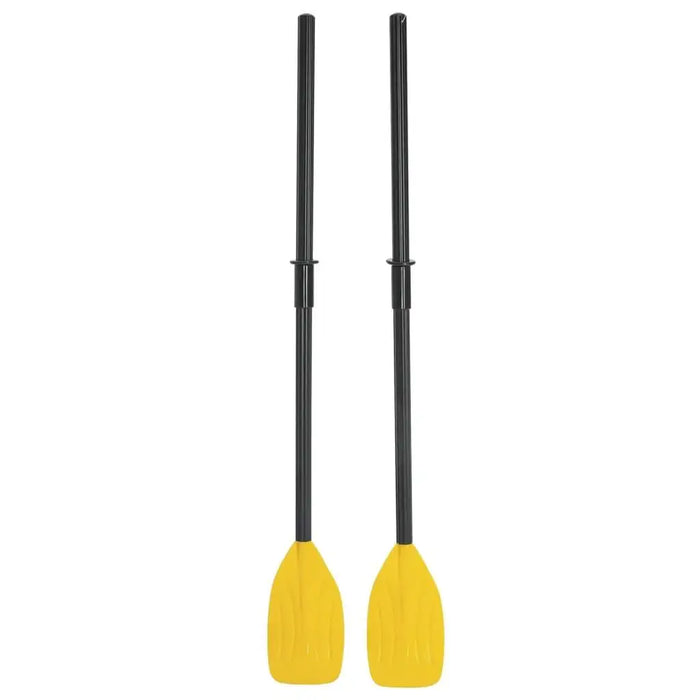 Pair of black plastic oars with yellow blades for inflatable boat on white background