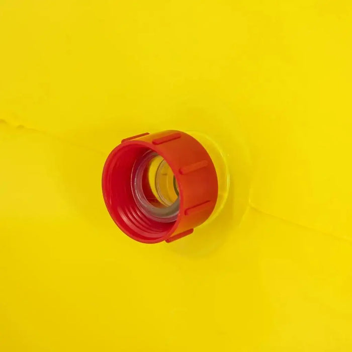 Close-up of red cap hose connector on yellow inflatable giraffe sprinkler toy