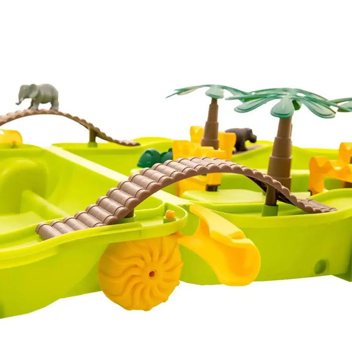 Jungle adventure water play table with bridges, palm trees, animal figures and yellow basin.