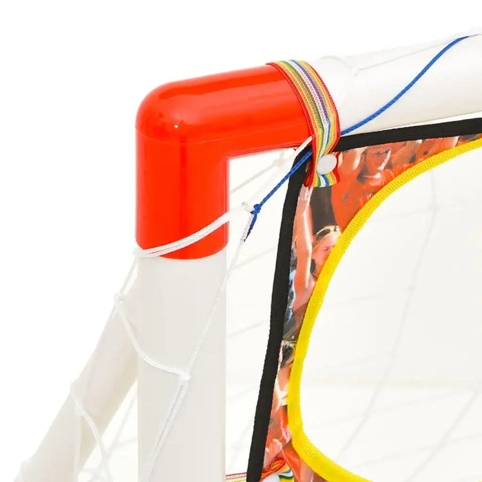Close-up of kids' football goal set with white frame, red corner, and attached net.
