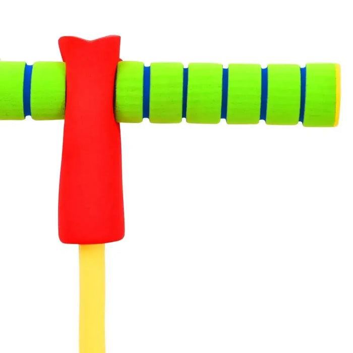 Close-up of kids pogo stick handle with green foam grips and red center on white background