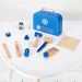 Kids wooden doctor set with blue medical case and toy instruments on white table