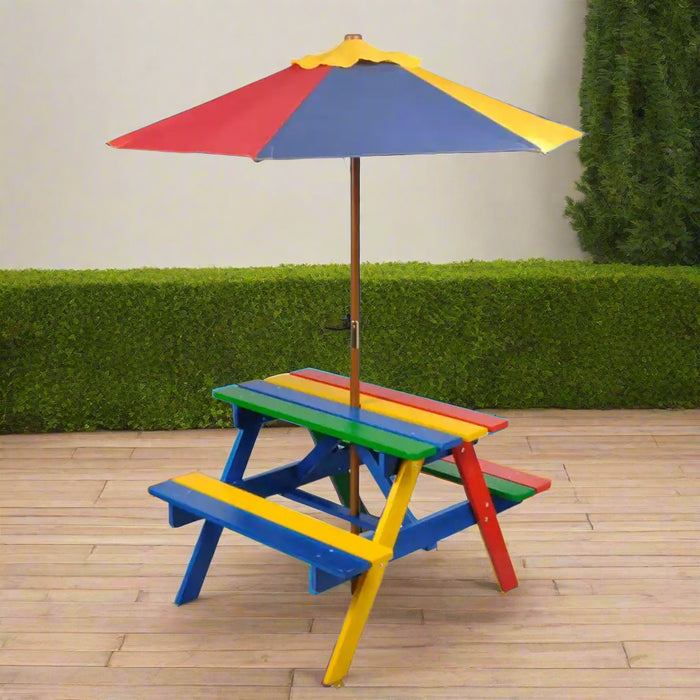 Kids wooden rainbow picnic table and bench set with colorful parasol outdoors
