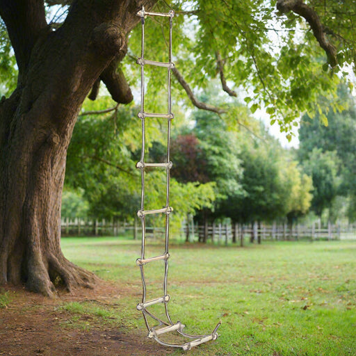 Kids wooden rope ladder with 8 solid pine steps hanging from a tree outdoors
