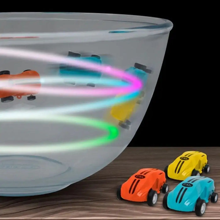Magic doodle cars with LED lights racing in a clear bowl, blue, orange, yellow toy cars