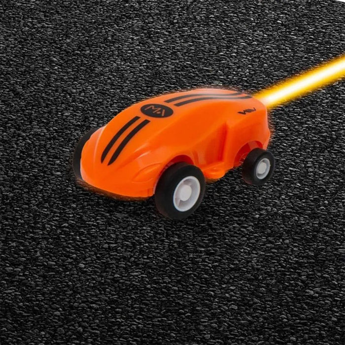 Orange magic doodle car toy with LED lights on black textured surface