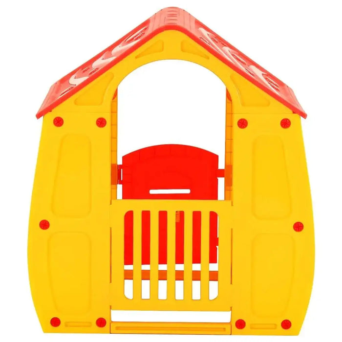 Colorful kids plastic playhouse with red roof and yellow walls, front door visible
