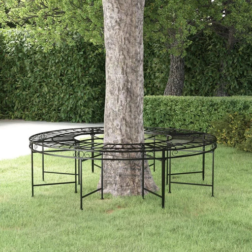 Black metal round tree bench with steel frame in garden on green grass