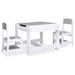 White children's table and chair set with double-sided tabletop
