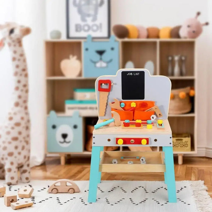 Wooden kids workbench toy set with tools in colorful playroom, ideal for imaginative play.