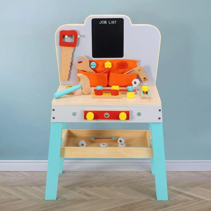 Wooden kids workbench with toy tools, bolts, and colorful storage bins against blue wall