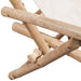 Close-up of bamboo outdoor deck chair frame with natural finish and fabric seat