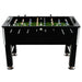 Professional black foosball table with adjustable legs and green tournament pitch