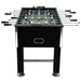 Black professional foosball table with metal rods and adjustable legs on white background