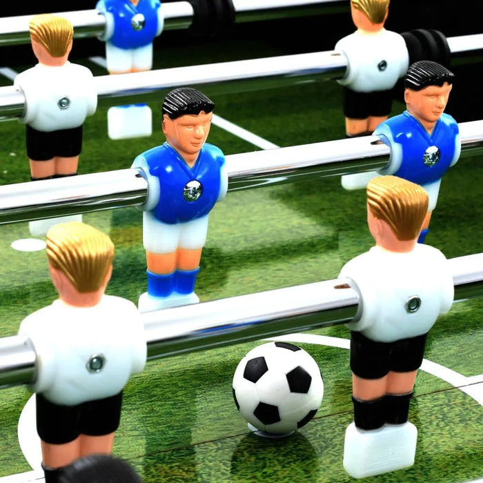 Close-up of professional football table with blue and white players and black-and-white ball