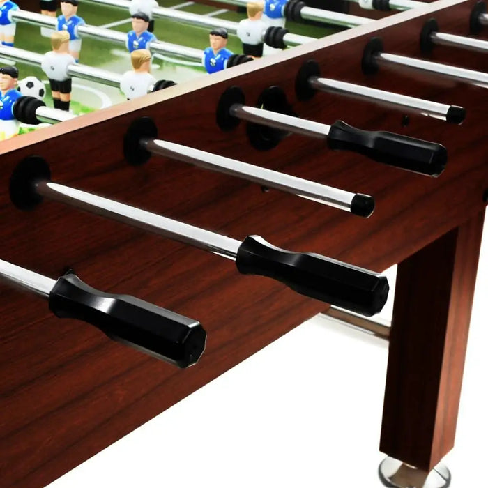 Professional brown wood football table with metal rods, black handles, and player figures