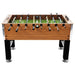 Professional football table with light brown wood finish, black legs, and adjustable height