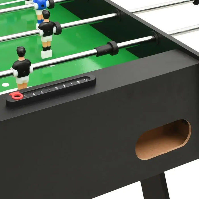 Black professional tournament football table with player rods, score counter, and green playfield