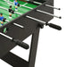 Black competition-grade foosball table with player rods and green playfield