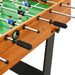 Professional tournament football table with wood finish, black handles, and foosball players