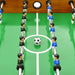 Professional tournament football table with foosball players and soccer ball on green field