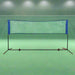Height adjustable steel frame badminton net set on indoor court