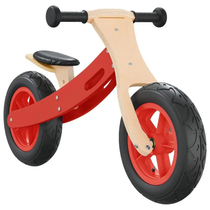 Red and natural wood balance bike with black seat and adjustable handlebars