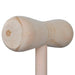 Close-up of wooden croquet mallet head, smooth natural finish, garden game equipment