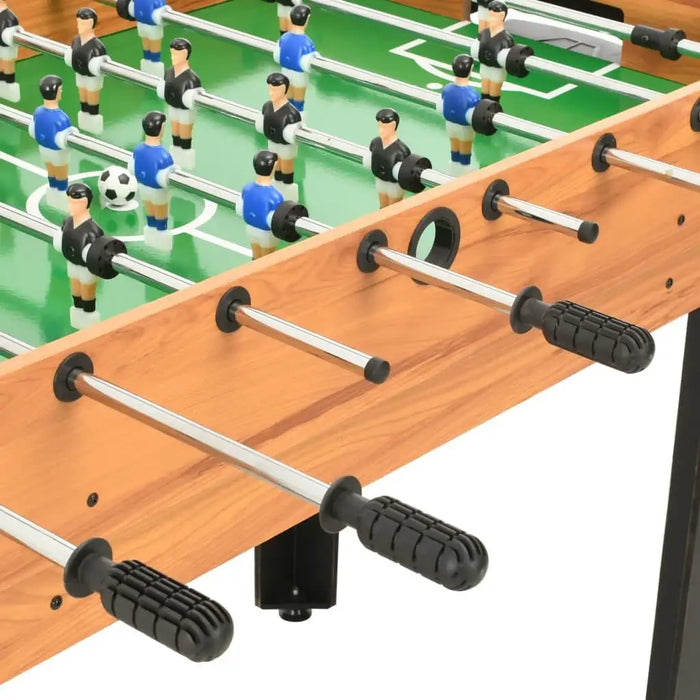 Foosball table with maple finish, black handles, and blue and black player figures