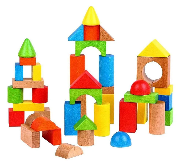 Colorful wooden building blocks in various shapes stacked on a white background.