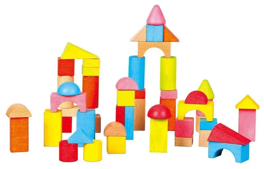 Colorful wooden building blocks in various shapes stacked creatively on a white background