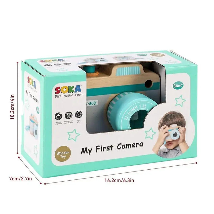 SOKA wooden toy camera in turquoise gift box, labeled 'My First Camera' with child model and dimensions