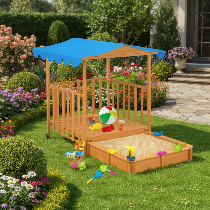 Wooden playhouse and sandbox combo with blue UV50 canopy, toys, and garden background