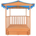 Wooden playhouse with sandbox, blue UV50 canopy, and open railings for kids