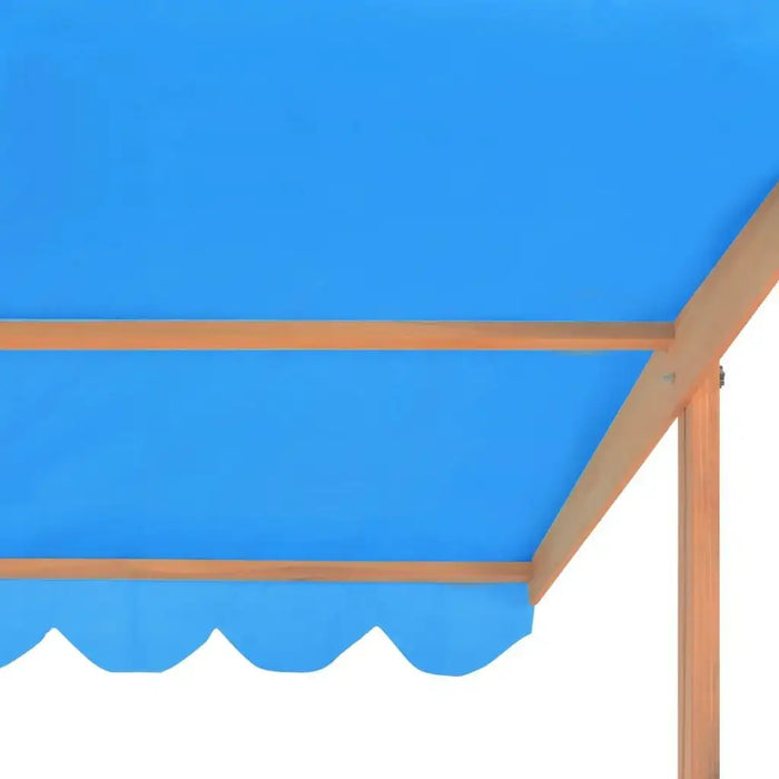 Adjustable blue UV50 roof canopy on wooden sandbox frame, close-up view